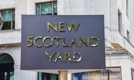 New Scotland Yard sign at the Metropolitan police headquarters in Westminster