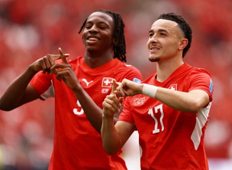 Switzerland's Ruben Vargas (right) celebrates scoring their first goal with Johan Manzambi.