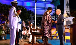 Charles, Prince of Wales (R) receives the Order of Freedom of Barbados from President of Barbados Dame Sandra Mason (2nd R) during the ceremony to declare Barbados a Republic and the Inauguration of the President of Barbados at Heroes Square in Bridgetown, Barbados, on November 30, 2021.  (Photo by Randy Brooks / AFP) (Photo by RANDY BROOKS/AFP via Getty Images)