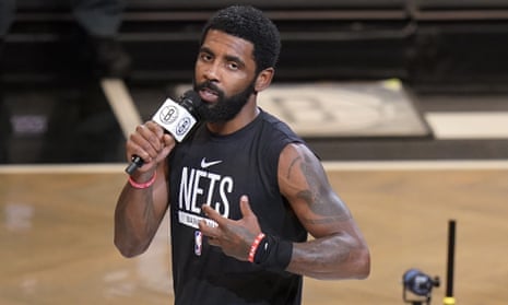 Nets' Kyrie Irving is back along with the mask he despises