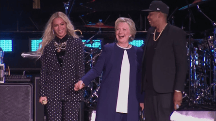 Beyoncé and Jay Z pledge their support for Hillary Clinton at a concert in Cleveland.