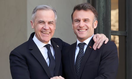 Carney and Macron embrace