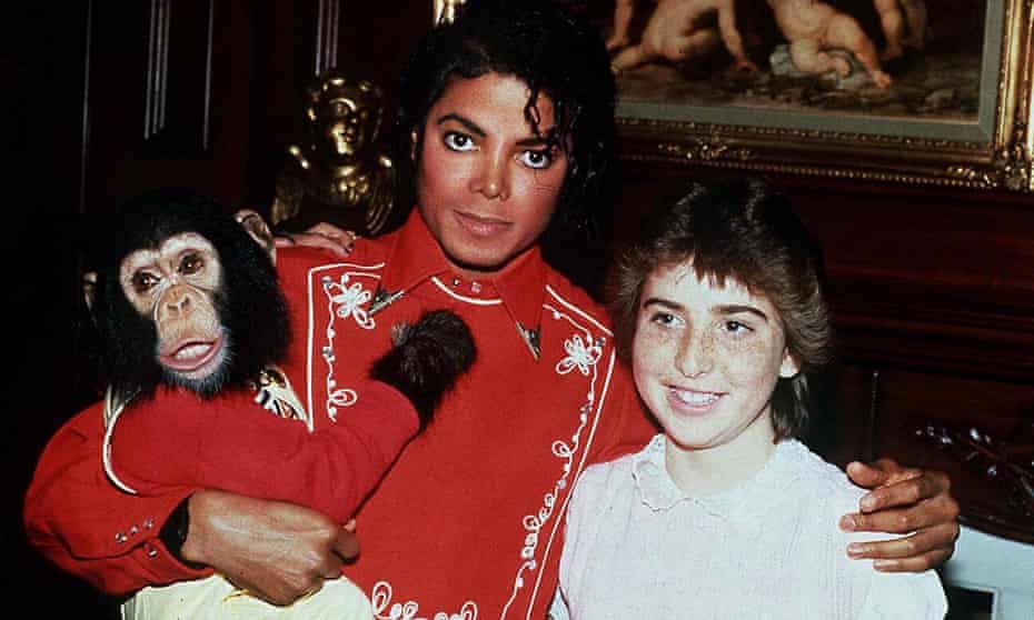 Michael Jackson and his chimp Bubbles meet a teenage fan in 1994.