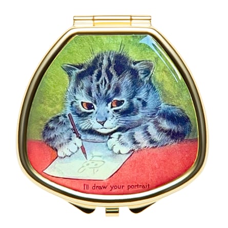 Compact with picture of blue cat drawing a bunny