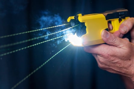 A Taser is fired
