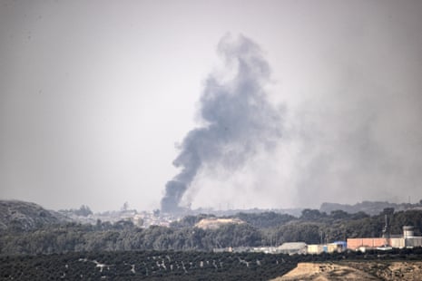 Smoke rising over Gaza City is seen from Be’eri kibbutz in Israel as airstrikes continue