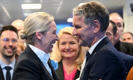 Alice Weidel and Björn Höcke smile at each other