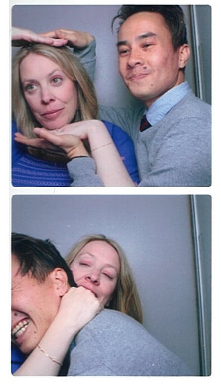 Tommy and Aimee larking about in a phone booth at their friends’ wedding reception.