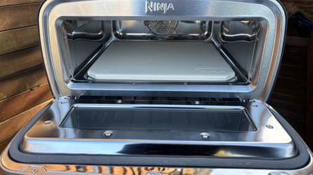 The Ninja Artisan with door open and pizza stone showing.