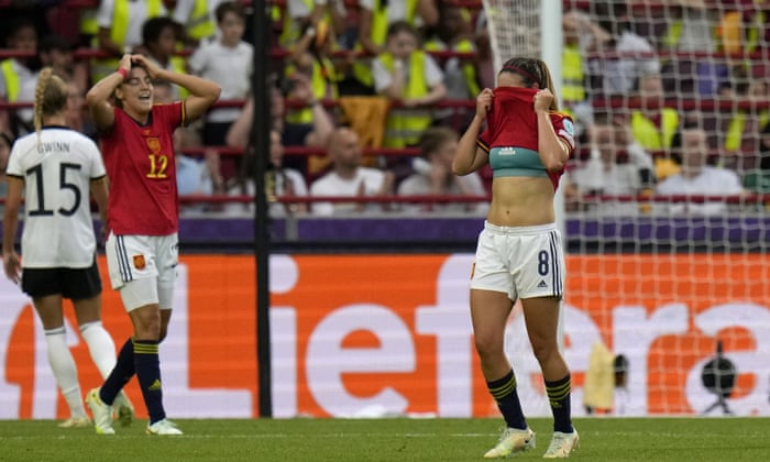 Spaniards Mariona (right) and Patri Guijarro react after Mariona's shot went to the wrong side of the upright.