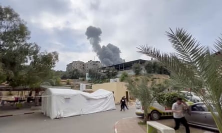 A screen grab from a video shows smoke rising after Israeli airstrikes on the Indonesian hospital in the Jabalia neighbourhood of Gaza City on Sunday.
