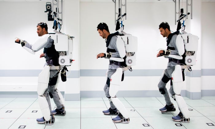 Paralysed man walks using mind-controlled exoskeleton | France | The Guardian
