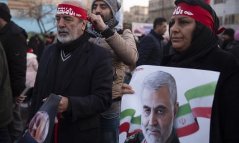 Mourners in Tehran attend a funeral ceremony for Qassem Suleimani.