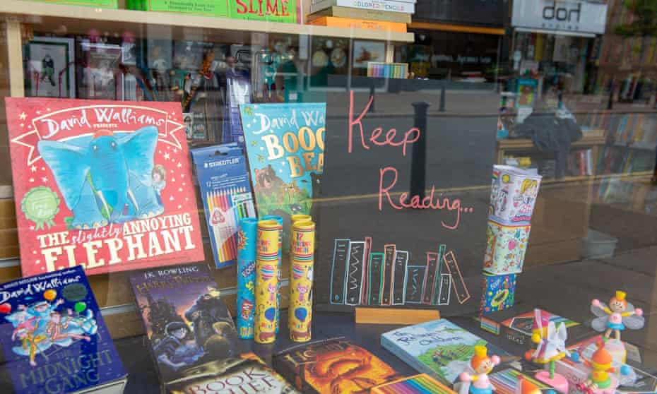 A bookshop window during lockdown has a sign that says: 'Keep reading'