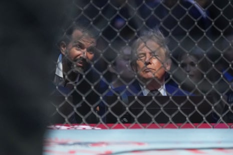 Donald Trump watches Sunday’s fights from cageside beside Donald Trump Jr.
