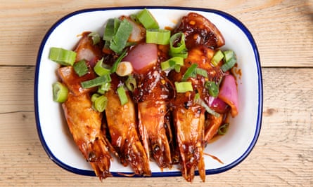 ‘Brilliant crimson with a sweet-sour sauce in even deeper red’: devilled prawns.
