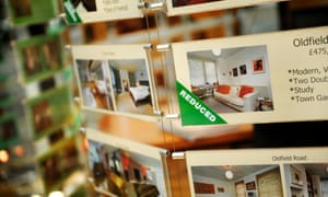 Reduced sign in estate agent's window