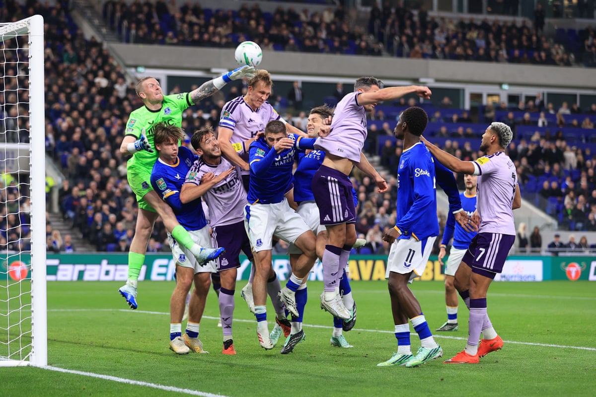 Jordan Pickford punching the ball away from Dan Burn during Everton Newcastle October 29 2026