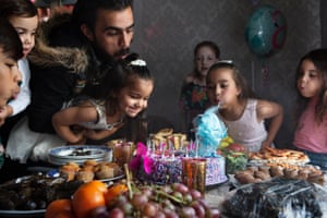 Rayan and Hanan share a birthday spread which includes Arabic foods alongside more anglicized foods like pizza and fairy cakes