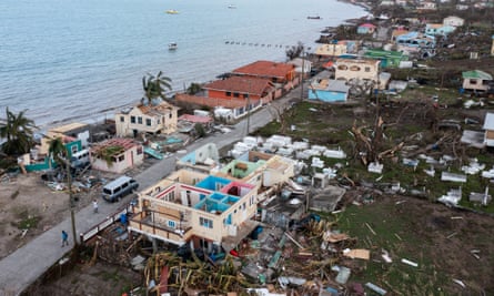 Damaged buildings on a shoreline