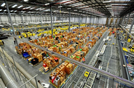Awarehouse operated by Amazon, which is now worth more than $1tn