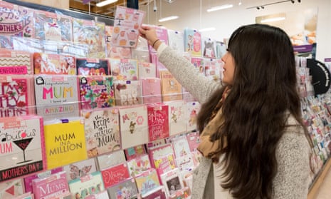 Woman buying greeting cards