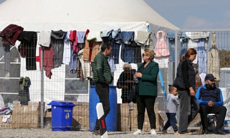 People gather near an aid centre for refugees from the Nagorno-Karabakh region in the border village of Kornidzor, Armenia, on 29 September
