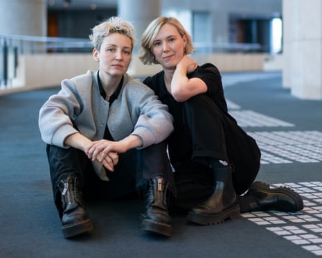 Choreographers Jessica Wright and Morgann Runacre-Temple sit together on the floor