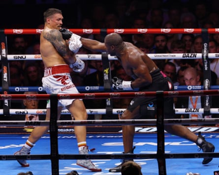 Daniel Dubois aims a punch at Oleksandr Usyk at Wembley in July 2025