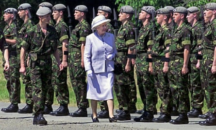 Inspecting the troops ... everyone who joins the army or RAF swears allegiance to the Queen, not the government of the day. Photograph: Rainer Jens/EPA