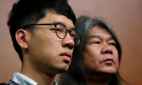 Nathan Law (left) and Leung Kwok-hung.