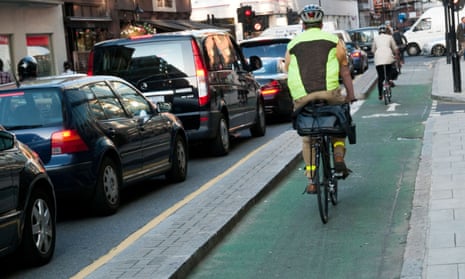 A cyclist on a bike lane in London