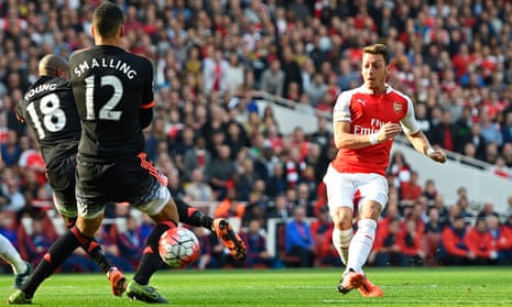 Mesut Ozil scores the second goal for Arsenal.