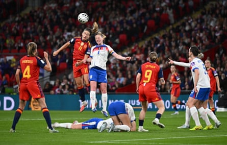 Keira Walsh of England battles for possession with Spain’s Alexia Putellas.