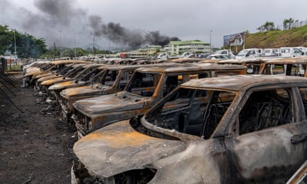 Burnt cars in Noumea, New Caledonia. The French government has imposed a state of emergency in the Pacific territory