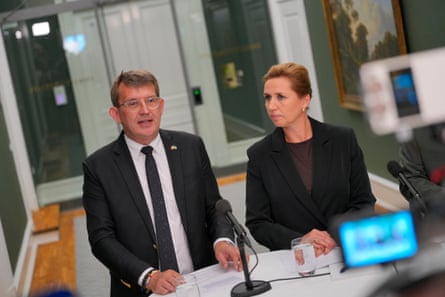 Troels Lund Poulsen, the defence minister, with Mette Frederiksen in a studio