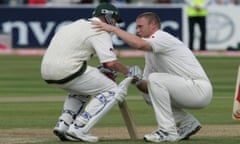 Andrew Flintoff consoles Brett Lee after England win the second Ashes Test match of 2005 at Edgbaston.