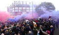 Aston Villa fans set off flares as the team coach arrives ahead of the Premier League match at Villa Park.