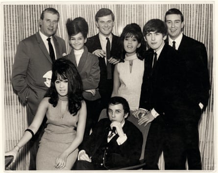 Tony King (standing, third left) with Ronitz, Phil Spector (seated), and George Harrison in 1964