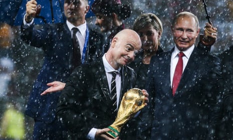 The Fifa president, Gianni Infantino (centre), with Vladimir Putin at the final of the 2018 World Cup in Russia.