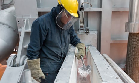 worker in aluminium smelter
