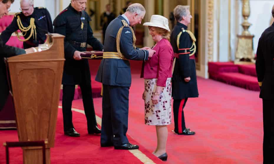Caroline Watkins DBE receives award from Prince Charles