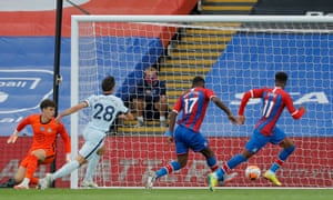 Palace’s Christian Benteke (second right) slots the ball home.