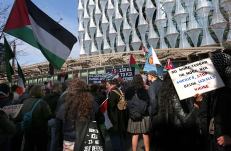 Protesters with anti imperialist banners protest outside the US embassy during the demonstration on March 22, 2026 in London, UK