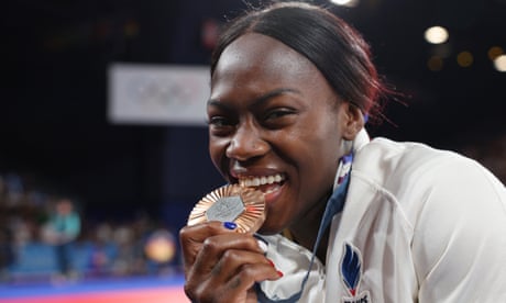 Clarisse Agbégnénou of France celebrates with her bronze medal