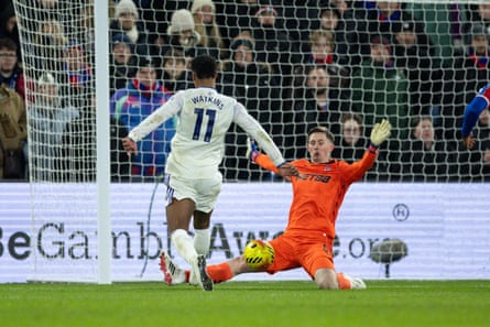 Dean Henderson pulls off a save to deny Ollie Watkins