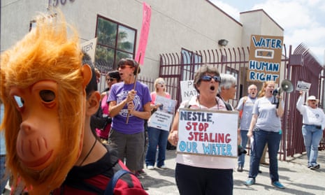 Demonstrators protest against Nestle water bottling operations in California. According to news reports, Nestle, which operates five bottling plants in California, uses 244m gallons of water annually. Reports also said that its state water permit expired 27 years ago.