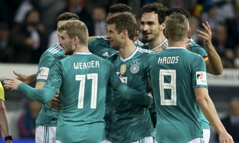 Thomas Muller of Germany celebrates his goal with teammates during the friendly against Spain.