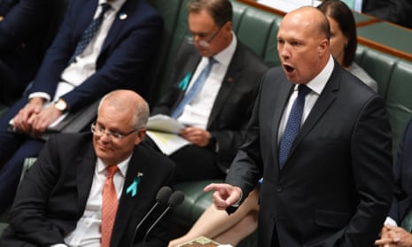Australian Parliament Question Time<br>CANBERRA, AUSTRALIA - FEBRUARY 13: Home Affairs Minister 
Peter Dutton speaks next to Prime Minister Scott Morrison (L) during Question Time in the House of Representatives at Parliament House on February 13, 2019 in Canberra, Australia. The government suffered an historic one-vote defeat on the medical evacuation bill on Tuesday night. It is the first time in 90 years a sitting government has lost a vote on its own legislation. (Photo by Tracey Nearmy/Getty Images)