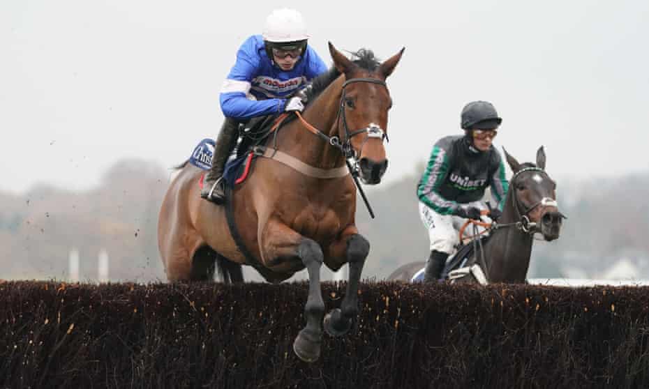 Cyrname ridden by Harry Cobden clears the final fence on his way to victory over Altior (right).